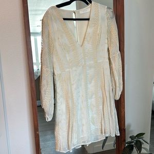 White Astr dress with see through sleeves and ivory print / size M